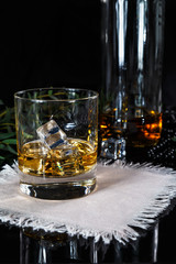 whiskey with ice in glass