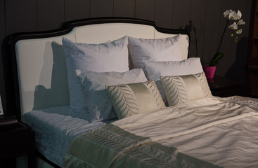 Bed with white pillows