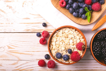 Raspberry, blueberry with mint and oatmeal breakfast or smoothie.