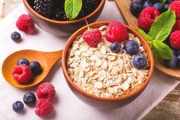 Raspberry, blueberry with mint and oatmeal breakfast or smoothie.