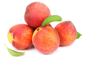 Peach. Fruit with green leaf isolated on white background