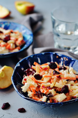 Carrot apple dried cranberries slaw