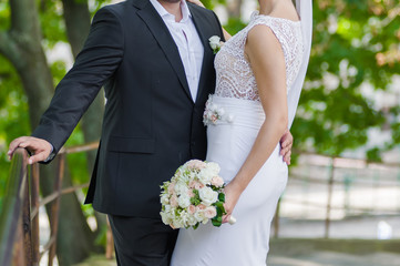 Beautiful bride with bouquet before wedding ceremony