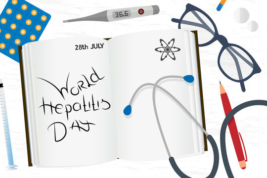 Notebook with the inscription World Hepatitis Day and medical supplies