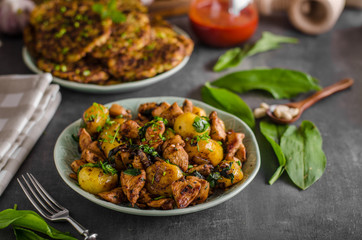 Potato pancakes, fried chicken with potatoes