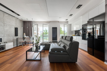 Gray sofa and black table