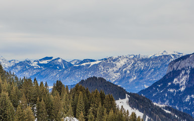 Fototapeta na wymiar Mountains with snow in winter. Ski resort of Soll, Tyrol, Austria