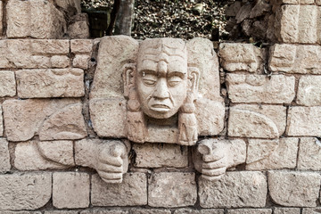 Fototapeta na wymiar Sculpture at the archaeological site Copan, Honduras