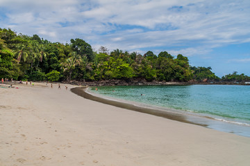 MANUEL ANTONIO, COSTA RICA - MAY 13, 2016: Tourists on a beach in National Park Manuel Antonio, Costa Rica