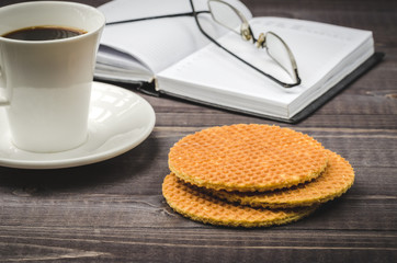 Waffles on a wooden background/Waffles on a wooden table