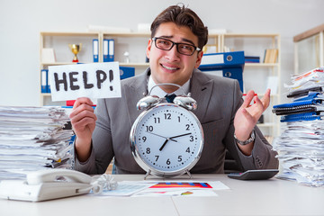 Businessman missing deadlines due to excessive work