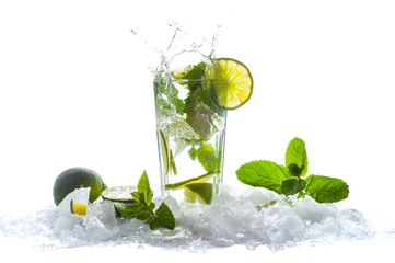 Mojito, a cool cocktail of lime and mint and soda, in a highball glass with a splash and ice, isolated on a white background