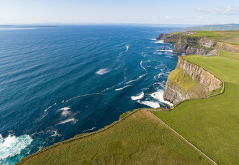 Aerial birds eye view from the world famous cliffs of moher in county clare ireland. beautiful irish scenic landscape nature in the rural countryside of ireland along the wild atlantic way.
