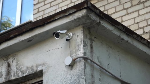 surveillance camera on the wall of children's art school.