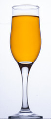 Yellow drink in the glass