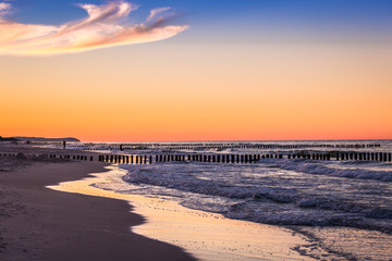 Obraz premium Baltic sea at beautiful sunrise in Poland beach.