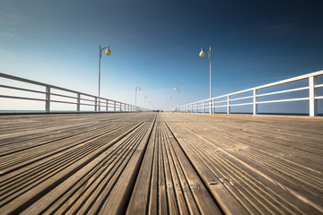 Wooden pier in Jurata town on coast of Baltic Sea, Hel peninsula, Poland