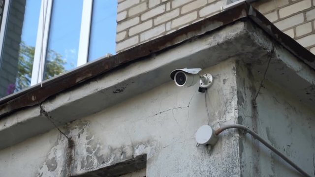 surveillance camera on the wall of children's art school.
