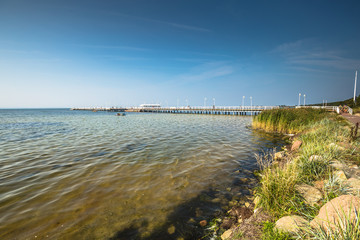 Wooden pier in Jurata town on coast of Baltic Sea, Hel peninsula, Poland