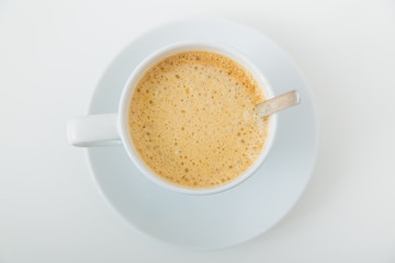 cup of coffee over white background