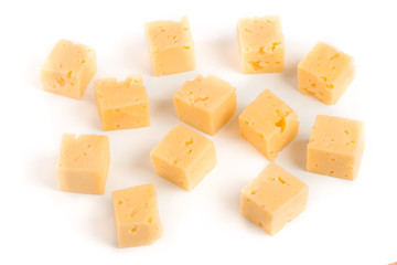 cheese cut into cubes isolated on white background