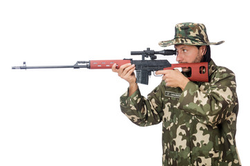 Soldier with weapons isolated on white