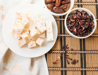 Dessert. Sweets. Fruit Souffle with slices of fruit jellies and dry petals Hibiscus.  Eastern sweets