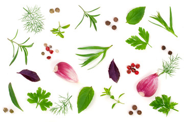 Fresh spices and herbs isolated on white background. Dill parsley basil thyme tartun peppercorns garlic. Top view