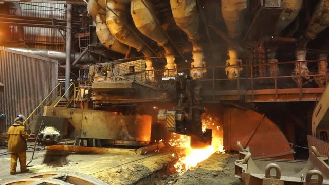 Equipment and machines at the metallurgical plant. Heavy industry. Stationary machines opening