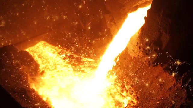 Liquid metal from blast furnace. Liquid iron from ladle in the steelworks