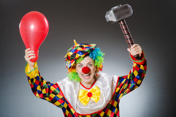 Fototapeta na wymiar Funny clown in comical concept