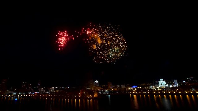 Big firework over the city. Beautiful big firework over the river