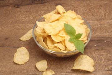Potato chips in a glass plate