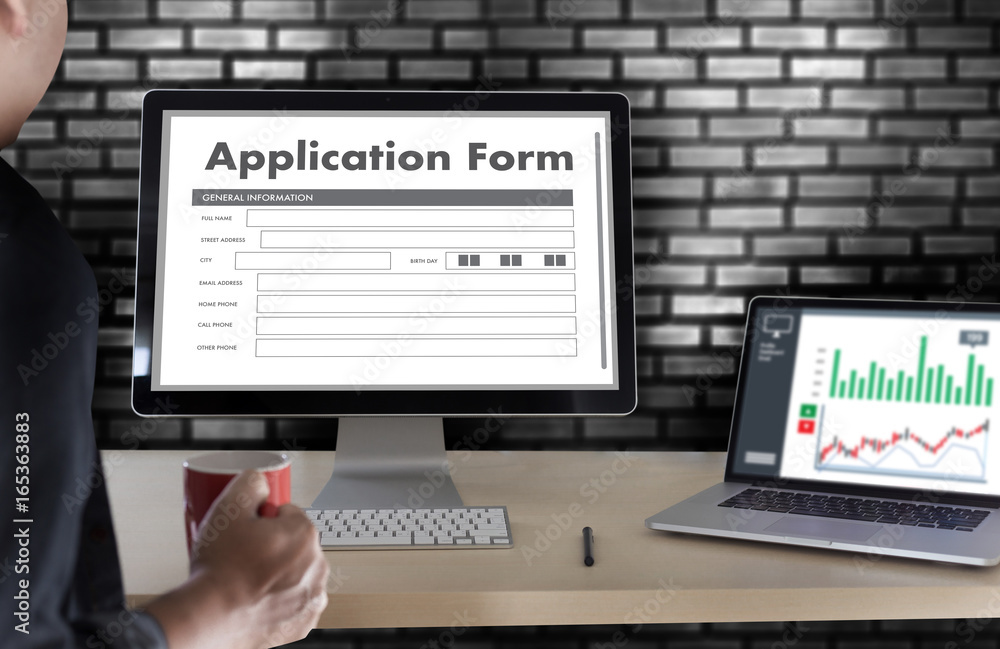 Aufkleber business man working on laptop computer use online web job application form moniter