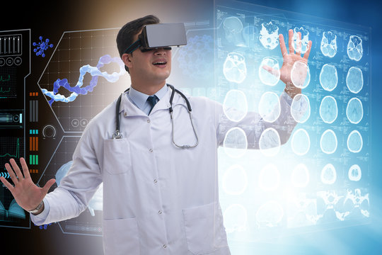 Doctor examining x-ray images using virtual reality glasses