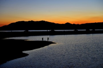 Fishing at Big Bear Lake, California, at dusk