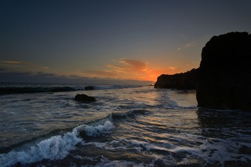 Fototapeta na wymiar Sunset scene at the El Matador Beach, Malibu, California