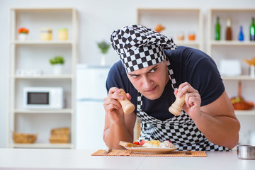 Chef cook cooking a meal breakfast dinner in the kitchen