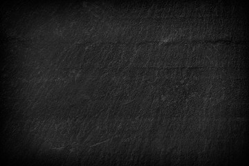 Dark grey black slate background or texture.