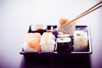 Eating maki sushi box