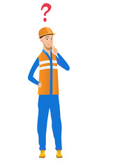 Young caucasian builder with question mark.