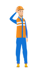 Young caucasian builder scratching head.