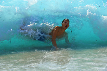 boy in a big wave