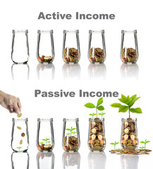 Active and Passive income concept of Gold coins and seed in clear bottle with text on white...