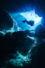 Rays of sunlight into the underwater cave