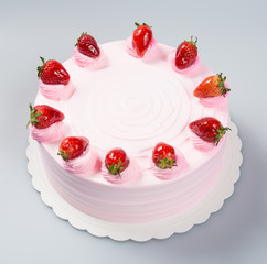 cake or cake with strawberries on a background.