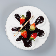 cake or cake with strawberries and chocolate on a background.