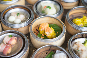 Chinese yumcha dimsum set in bamboo container.