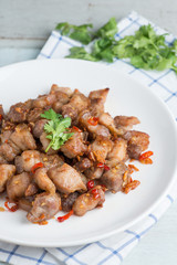 Fried pork crackling with garlic and chili.