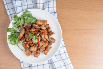 Fried pork crackling with garlic and chili.